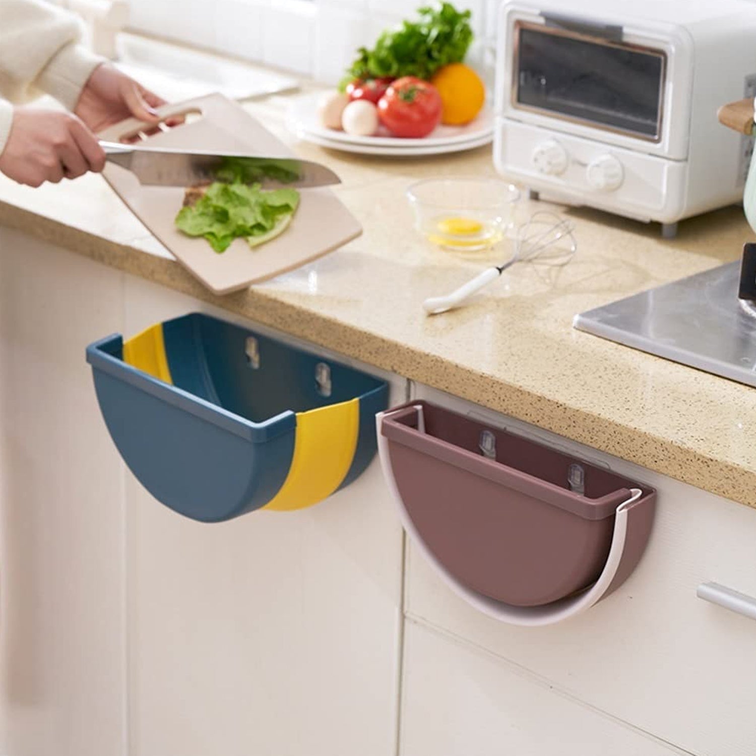 Compact hanging trash can for small spaces. Compact hanging trash can for small spaces.